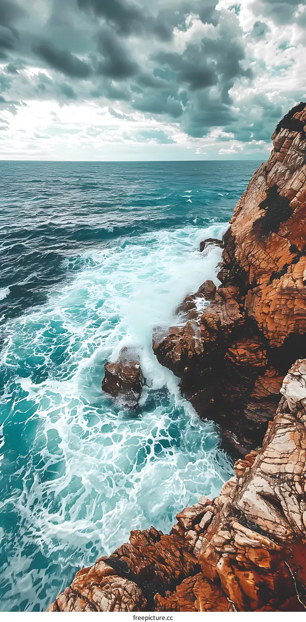 Ocean Waves Crashing on Rocky Coast Under Cloudy Sky
