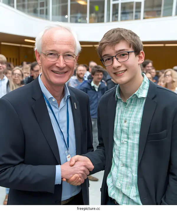 Two Men Shaking Hands in a Business Meeting