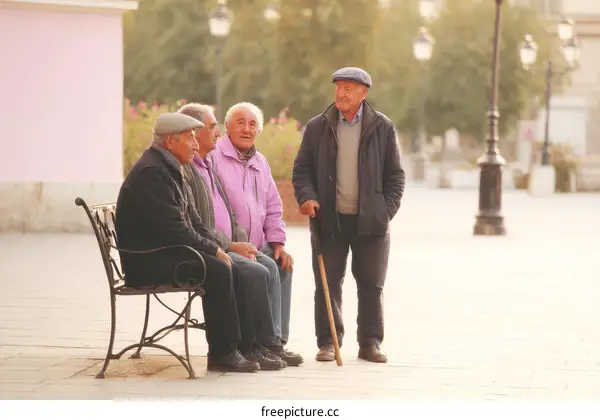 Elderly Men Relaxing on a City Bench