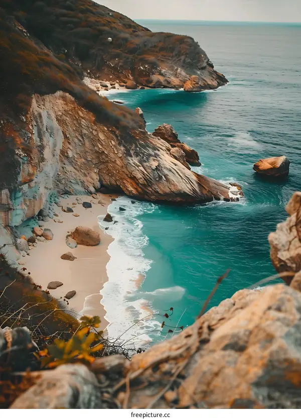 Aerial View of a Secluded Cove with White Sand Beach and Turquoise Water