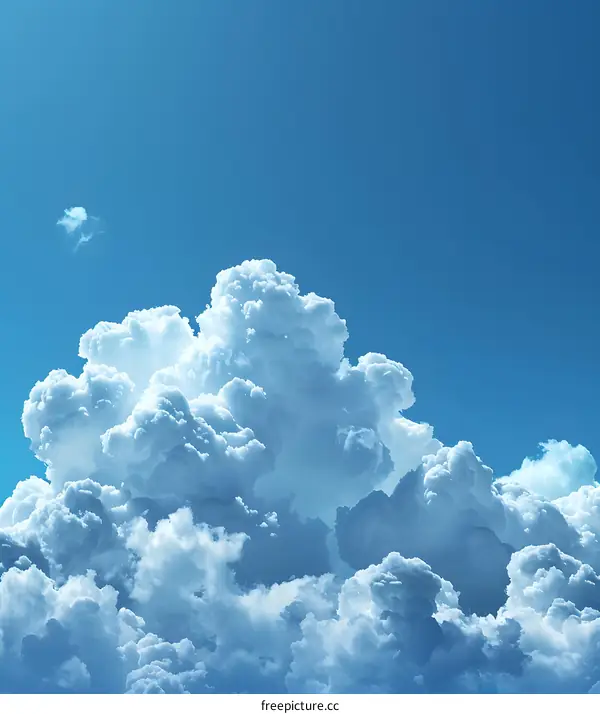 Fluffy cloudscape with bright blue sky