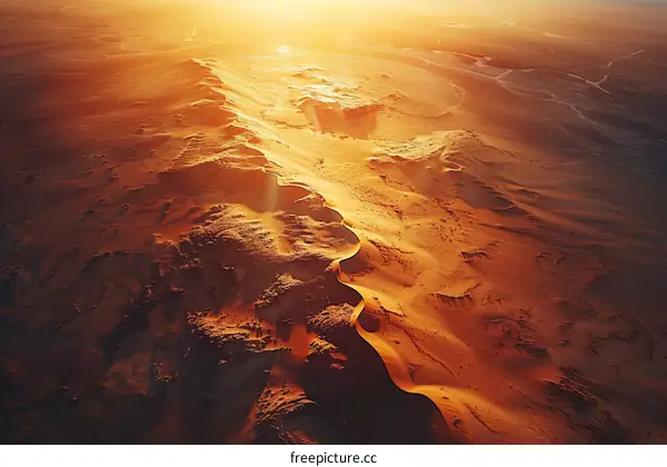 Amazing aerial view of the sand dunes in the middle of the desert