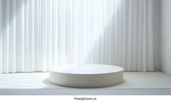 Empty White Round Display Podium Against Sheer Curtains