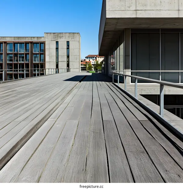 Modern Concrete Building Rooftop With Wooden Deck