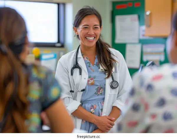 Female doctor talking to two nurses
