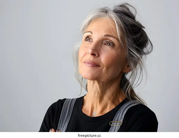 Portrait of a Senior Woman With Gray Hair Looking Up