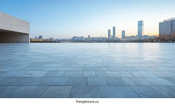 Empty Urban Plaza Facing Modern Cityscape