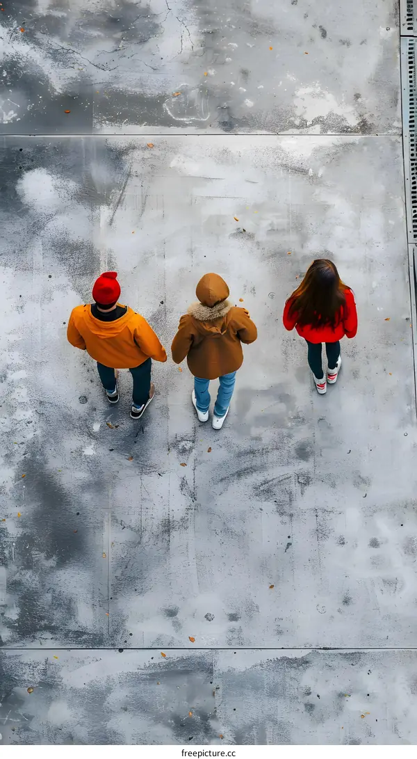 Three People Standing On The Street