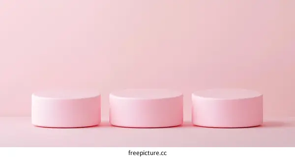 Pink Cylindrical Platforms Minimalist Background