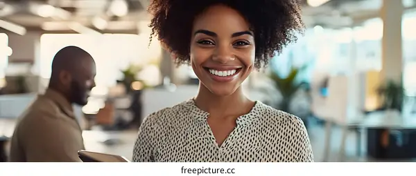 Smiling Businesswoman in Modern Office Setting