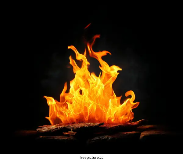 Fiery Flames Against Dark Background