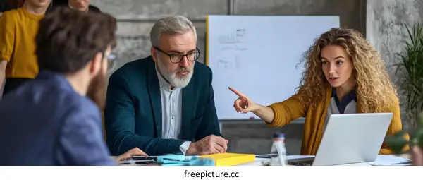 Business Meeting with Laptop and Presentation Board