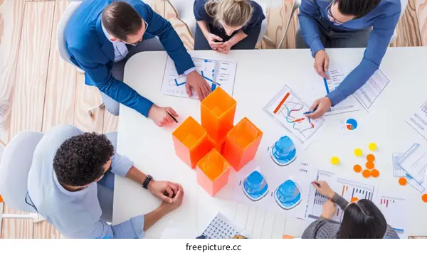 Business people discussing graphs and charts during a meeting