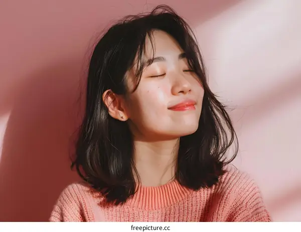 Young Woman with Eyes Closed Smiling