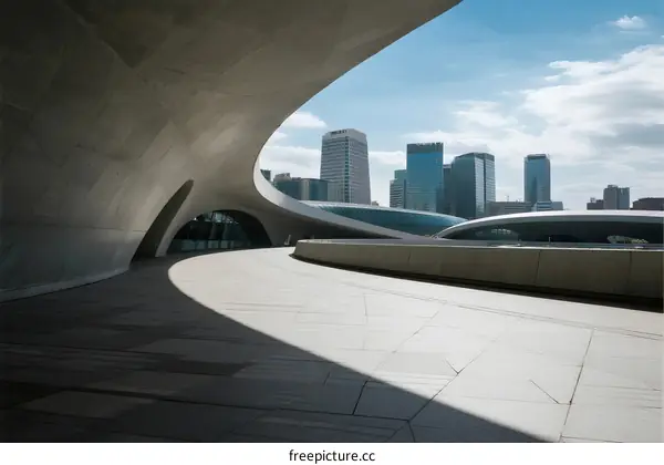 Modern architectural structure with city skyline in the background
