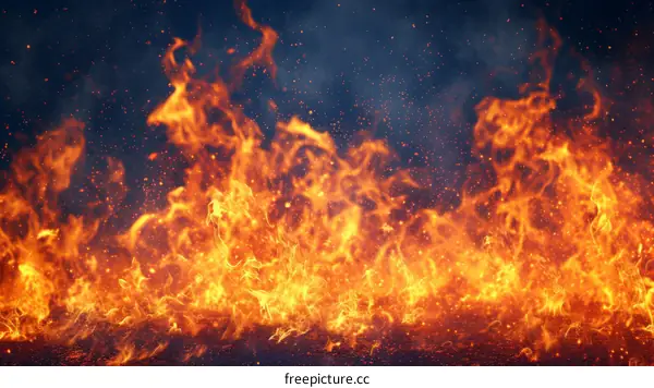 Fire background with flying burning cinders