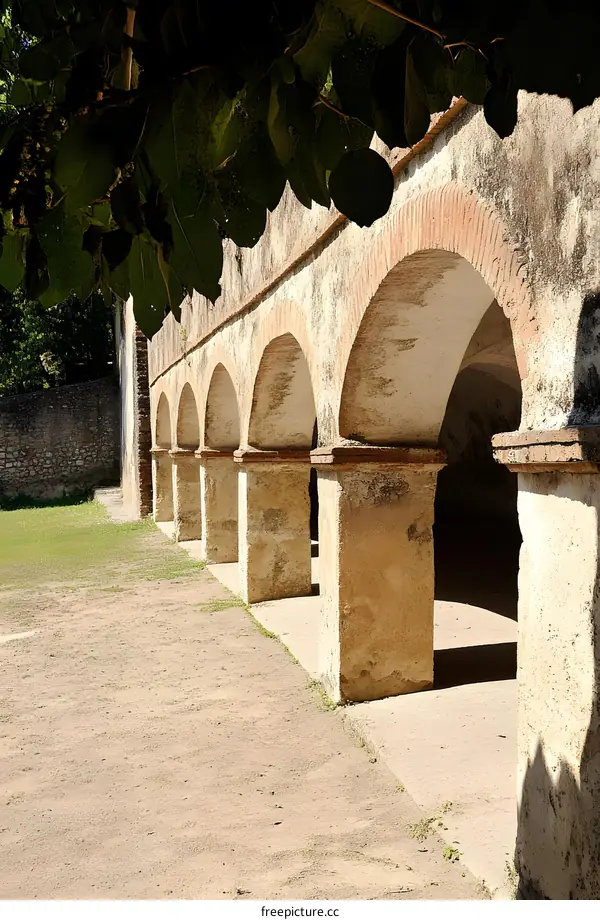 Stone Arches and Green Leaves