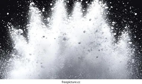 White Powder Explosion on Black Background