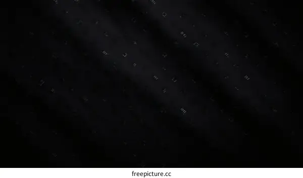 Dark Fabric with Embossed Alphabet Pattern