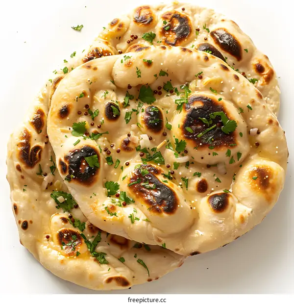 Naan bread with herbs and spices on a white background