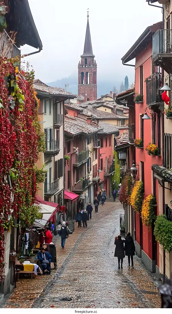 Cobblestone Street in Italian Town with Bell Tower