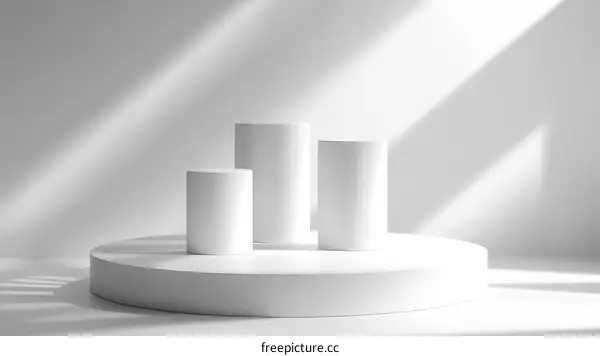 White Cylindrical Display Stands on a Platform