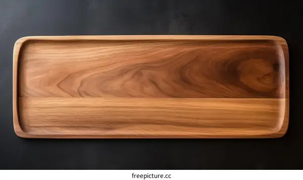 Empty Wooden Serving Tray Isolated on a Black Background