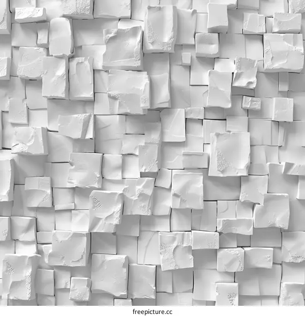 White concrete tiles with rough edges form an abstract 3D background