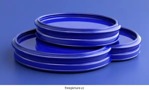 Blue Stacked Circular Forms on a Blue Background