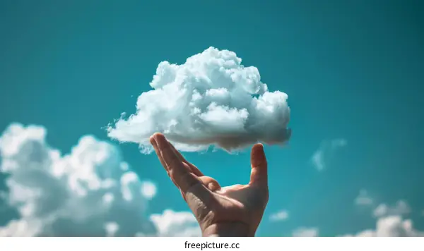 Cloud in the Blue Sky Cupped in the Palm of a Hand