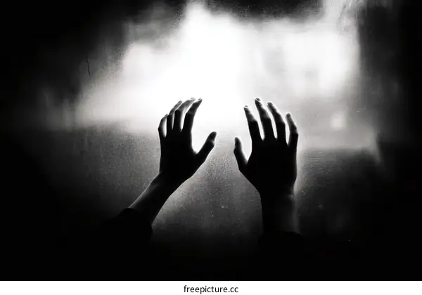 Reaching for Light in Darkness Silhouette Hands