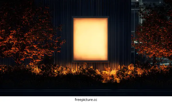 Modern Building with Illuminated Sign at Night