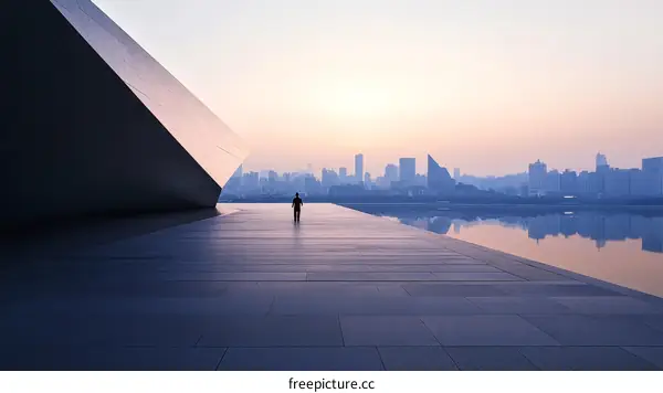 Modern Architecture and Urban Skyline at Sunrise with Single Person