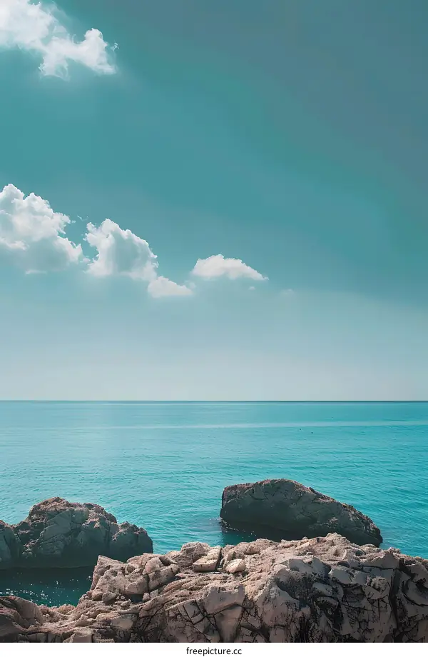 Seascape with Turquoise Water and White Clouds