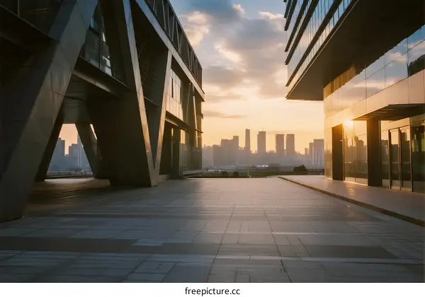Modern city buildings with sunset view in the background