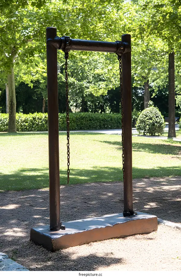 Empty Swing Set in a Green Park