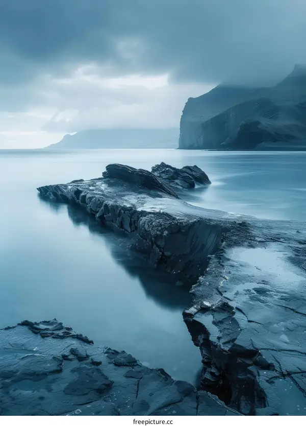 Rocky coast of Faroe Islands in evening light