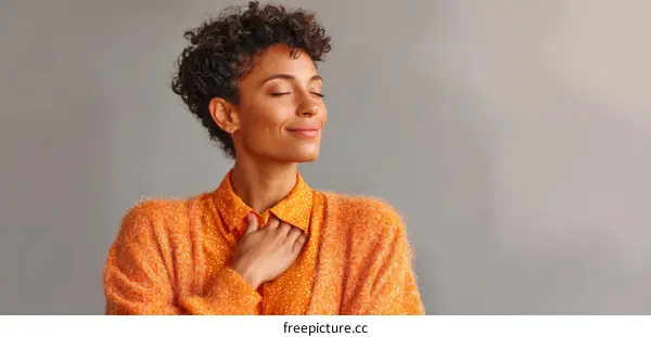 Woman in an Orange Knitted Cardigan