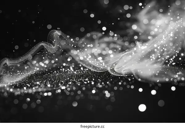 Black and white abstract background with a shiny wave pattern