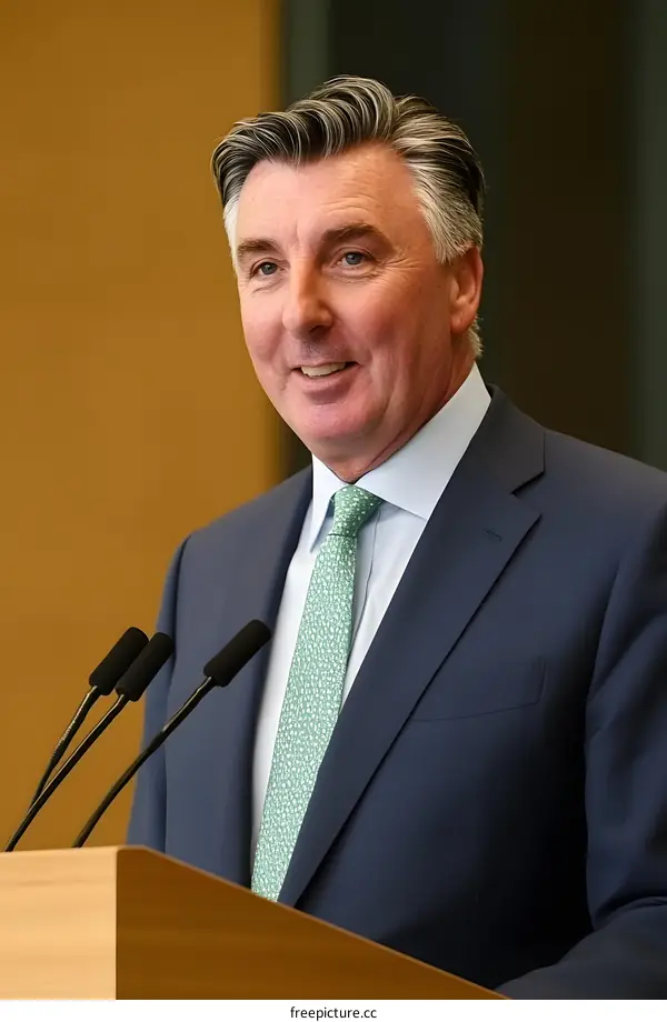 Caucasian Male Politician Speaking at a Podium