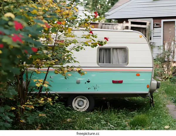 Vintage Camper Van Parked in the Backyard