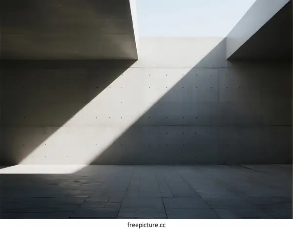 Concrete Building Structure with Sunlight and Geometric Shapes