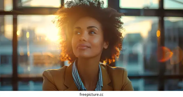 Portrait of a young African-American woman looking thoughtful