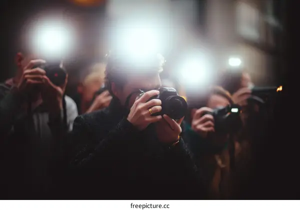 Paparazzi Crowd Capturing a Moment