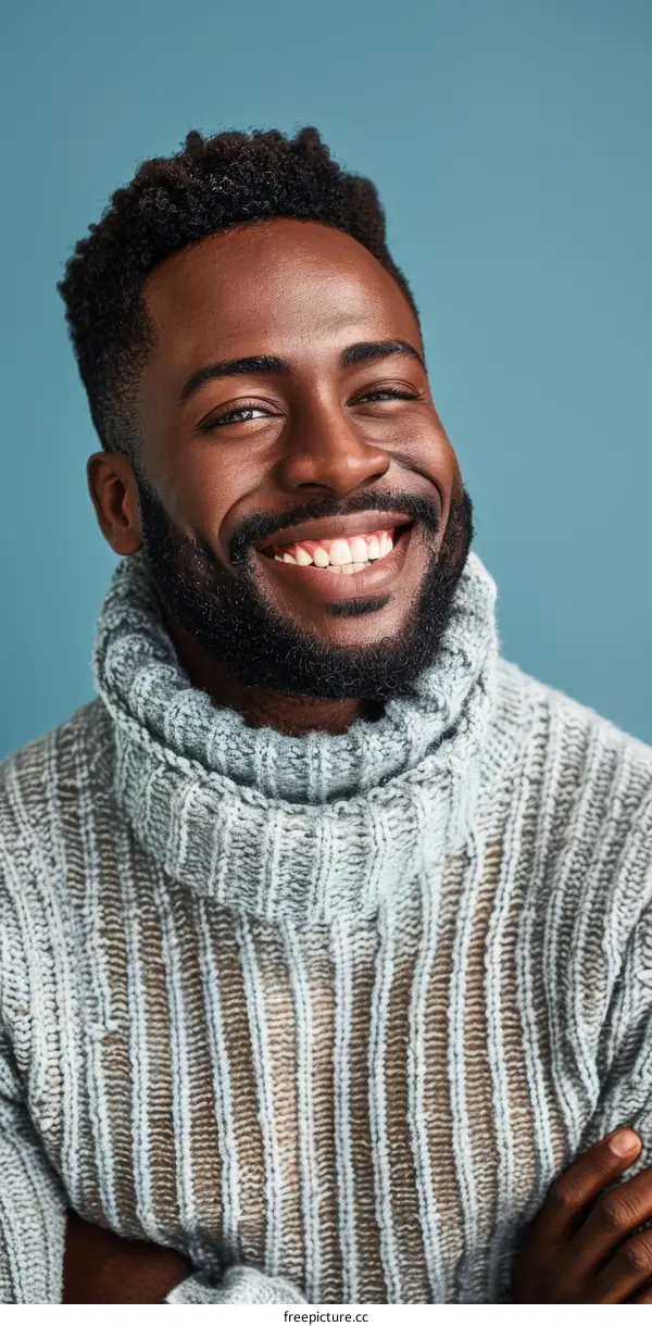 Happy African Man in a Knitted Sweater