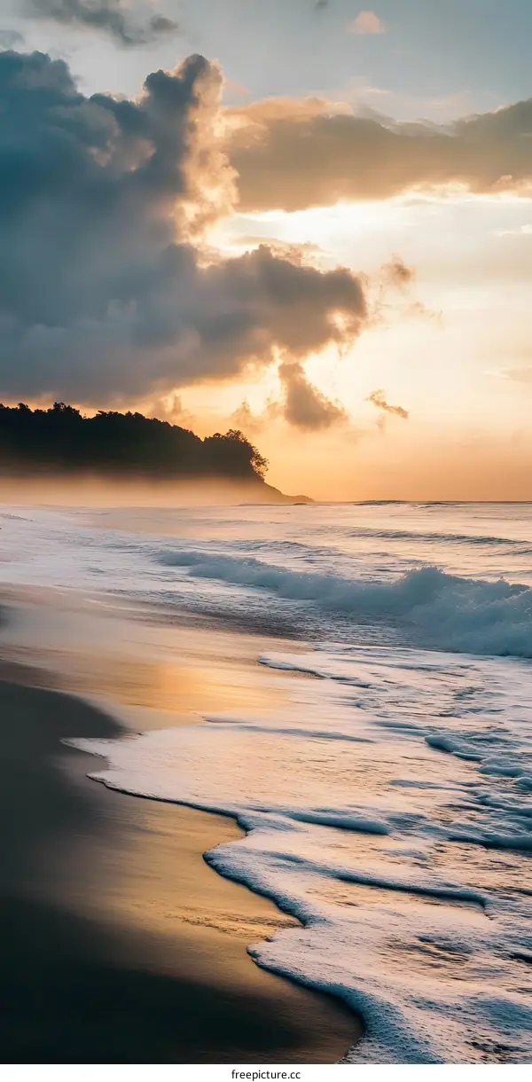 Beach Sunset with Waves and Golden Sky