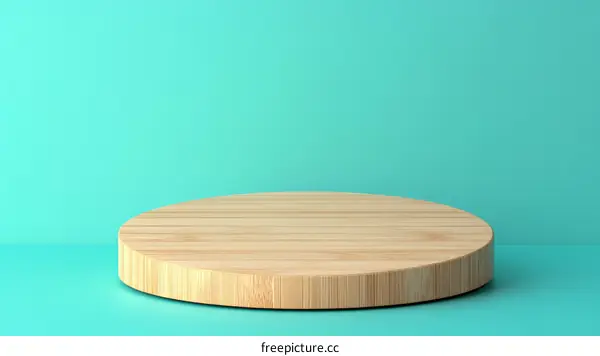 Wooden Round Display Podium Against Teal Background