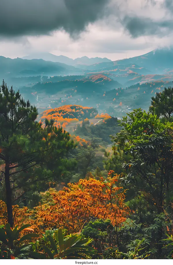 Autumn Landscape with Mountain Range and Cloudy Sky