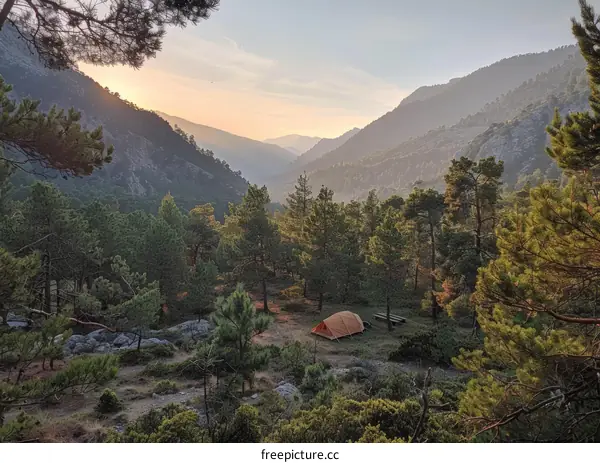 Camping in the mountains with a view of the valley