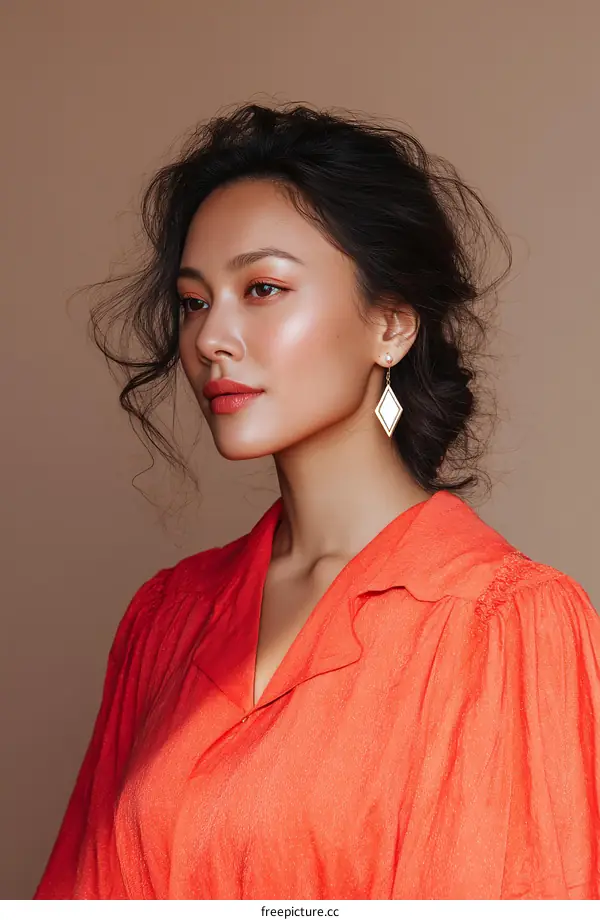 Beautiful Asian Woman in a Vibrant Coral Dress